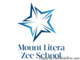 The image is a logo for Mount Litera Zee School. It is a blue star-shaped logo with a white background. The star is in the ce...