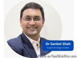 The image is a headshot of Dr. Sanket Shah, a surgical oncologist in Dadar. He is a man with short dark hair and glasses, wea...