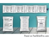 The image shows four white packets of Desiccants, a type of disinfectant, arranged in a horizontal line on a turquoise backgr...