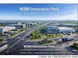 The image is an aerial view of M3M Innovation Park, a future-ready industrial and commercial destination. The park is located...