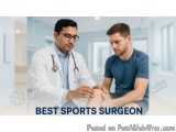 The image shows a doctor and a young man in a medical office. The doctor is wearing a white coat and a stethoscope around his...