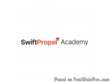 The image is a logo for SwiftPropel Academy. The logo is written in black text on a white background. The text reads "SwiftPr...