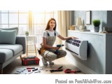 In this image, we can see a young woman in a living room, kneeling on the floor and working on an air conditioning unit. She...