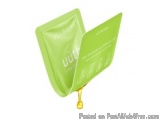 The image is a 3D rendering of a green origami crane. The crane has a triangular shape with a pointed tip and a small loop at...