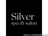 The image is a black square with white text in the center. The text reads "Silver Spa & Salon" in a modern, sans-serif font....