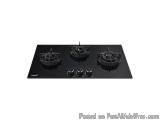 The image shows a black gas cooktop with three burners. The burners are round and have a flat surface. They are arranged in a...
