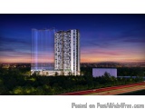 The image is a digital rendering of a modern high-rise building at night. The building is tall and has multiple floors and ba...
