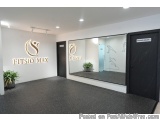 The image shows the entrance of a fitness center named "Fitsio Max". The entrance has a large mirror on the right side with a...