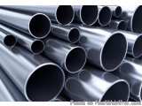 The image shows a group of multiple metal pipes stacked on top of each other. The pipes are of different sizes and shapes, wi...