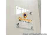 The image is a photograph of a square-shaped glass sign with the logo of Quapri, a company that produces quality prints and p...