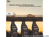 The image shows three bottles of Bharat Smazka engine oil. The bottles are black with the brand name and logo prominently dis...