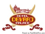 The image is a logo for a hotel named "Hotel Devraj Palace". The logo is circular in shape and has a red and gold color schem...