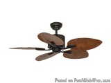 The image is of a ceiling fan with a black finish. The fan has four blades, each with a unique design. The blades are arrange...