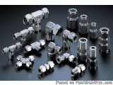 The image shows a collection of different types of threaded fittings and fittings. There are nine fittings in total, arranged...