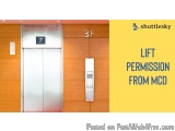 The image shows an elevator door with the number 7 on it. The door is made of stainless steel and has a silver finish. It is...