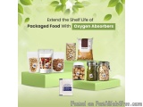 The image shows a collection of packaged food items arranged on a green shelf. There are six bags of different types of food,...