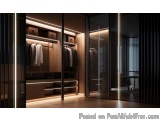 The image shows a modern and luxurious walk-in closet with a minimalist design. The closet has a large sliding door on the ri...
