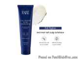The image is an advertisement for a product called "RAISE Fall Fighter Scalp Exfoliator". The product is a blue tube with a w...