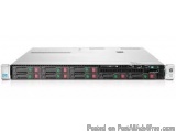 The image shows a rack-mounted server with multiple ports and switches. The server is silver in color and has a rectangular s...
