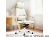 The image shows a modern office chair in a room with a wooden floor and a white wall. The chair is made of high-quality leath...