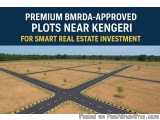 The image shows an aerial view of a rural area with a long, straight road in the center. The road is surrounded by dry grass...