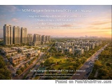 The image is an aerial view of M3M Gurgaon International City (GIC), Manesar, an integrated township with residential and com...