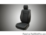 The image shows a black car seat with a headrest. The seat is made of leather and has a sleek and modern design. It has a rec...