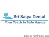 The image is a logo for Sri Satya Dental, a dental clinic in India. The logo is blue in color and has the company name writte...