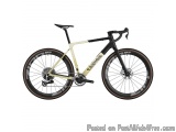 The image is of a bicycle, specifically a Cannondale Super Record Ultegra Di2. The bike is black and white in color with the...