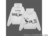 The image shows two white hoodies with black illustrations on the front. The hoodies have a drawstring hood and a kangaroo po...
