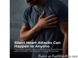 The image shows a man holding his chest in pain. He is wearing a dark blue t-shirt and appears to be in discomfort. The backg...