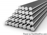 The image shows a group of stainless steel rods arranged in a horizontal line. The rods are cylindrical in shape and have a s...