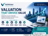 The image is an advertisement for ValAdvisor, a company that provides valuation services. The background of the image is a ci...