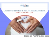 The image shows a pair of hands making a heart shape with a pregnancy test. The hands are positioned in a way that the finger...