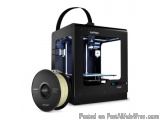 The image shows a 3D printer, specifically the Zortrax M1000, which is a type of 3D printing machine. The printer is black in...