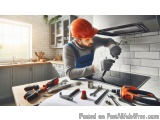 In this image, we can see a man wearing an orange hard hat and a blue apron, working in a kitchen. He is holding a screwdrive...