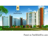 The image is a 3D rendering of a modern apartment complex called Sobha Infinia. The complex is located in a residential area...