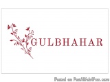 The image is a logo for a company named Gulbahar. The logo is written in a bold, sans-serif font and is in a dark red color....