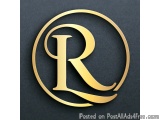 The image is a logo or emblem of the letter "R" in a circular shape. The letter is made of a shiny gold material and is place...