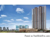 The image is a digital rendering of a modern high-rise building in a city. The building is tall and has multiple floors, with...