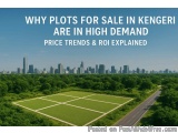 The image shows an aerial view of a city skyline in Kenya. The sky is blue and the buildings are tall and modern, with a few...