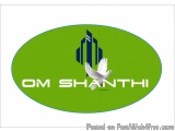 The image is a logo for OM Shanthi, a company that provides financial services in India. The logo is in the shape of an oval,...