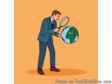 The image shows a man in a blue suit holding a magnifying glass over a globe. The man is standing in front of an orange backg...